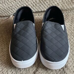 Oomphies Madison Black and White Slip-Ons